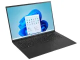 Czarny laptop LG z ekranem wyświetlającym menu startowe Windows 11. Czy warto zainwestować w ten system?
