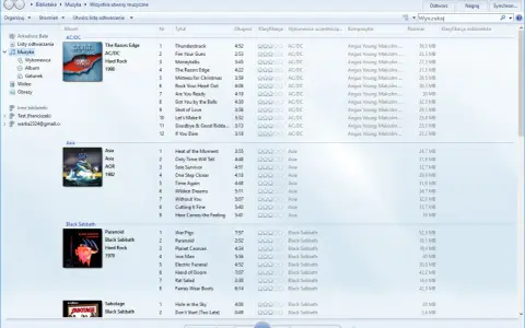 Windows Media Player z listą utworów AC/DC, Asia i Black Sabbath.