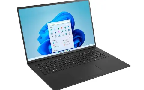 Czarny laptop LG z ekranem wyświetlającym menu startowe Windows 11. Czy warto zainwestować w ten system?