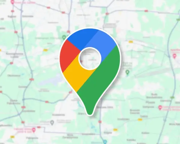 Ikona Google Maps na tle mapy. To narzędzie, które pozwala śledzić google maps historia podróży i odkrywać nowe miejsca.