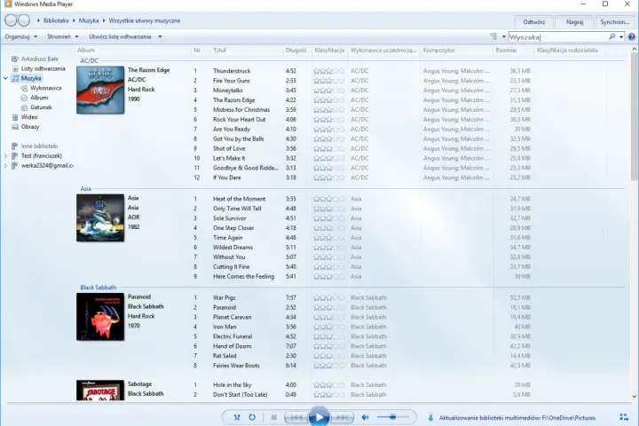 Windows Media Player z listą utworów AC/DC, Asia i Black Sabbath.