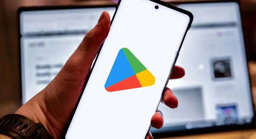 Smartfon z logo Sklepu Play. Dowiedz się, jak zainstalować Sklep Play na swoim urządzeniu.