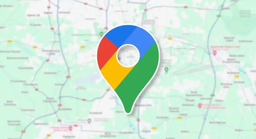 Ikona Google Maps na tle mapy. To narzędzie, które pozwala śledzić google maps historia podróży i odkrywać nowe miejsca.