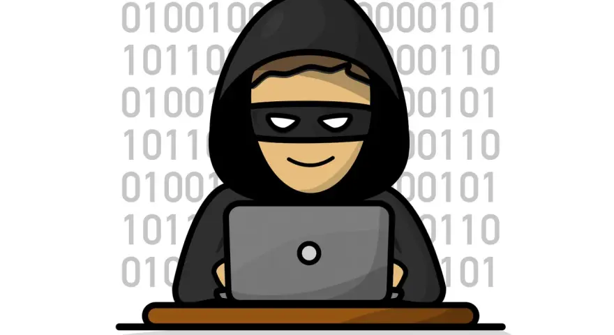 Uśmiechnięty haker w kapturze i masce siedzi przy laptopie, otoczony kodem binarnym. Może to być symbol działania keyloggera.
